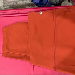 Lululemon Orange leggings, inseam 23-24, wide band at top , super soft.